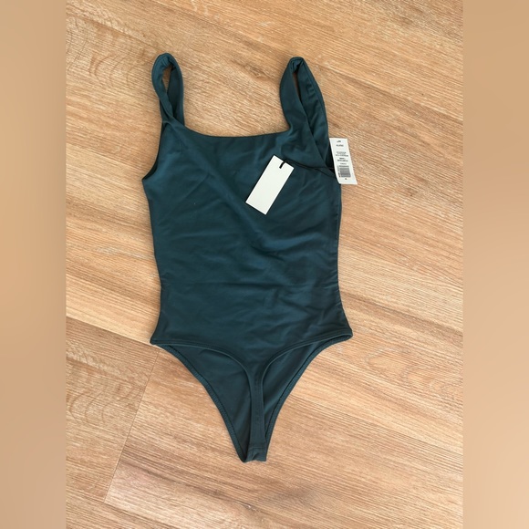 Contour tank thong bodysuit. Never worn. Didn’t match green skirt I purchased. - Picture 3 of 3